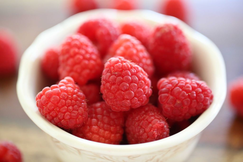 Dish of fresh raspberries