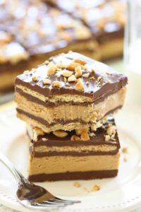 a bite of Peanut Butter Squares